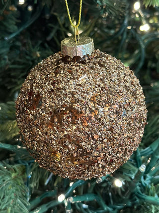 Pallina natalizia glitter in rilievo bronzo
